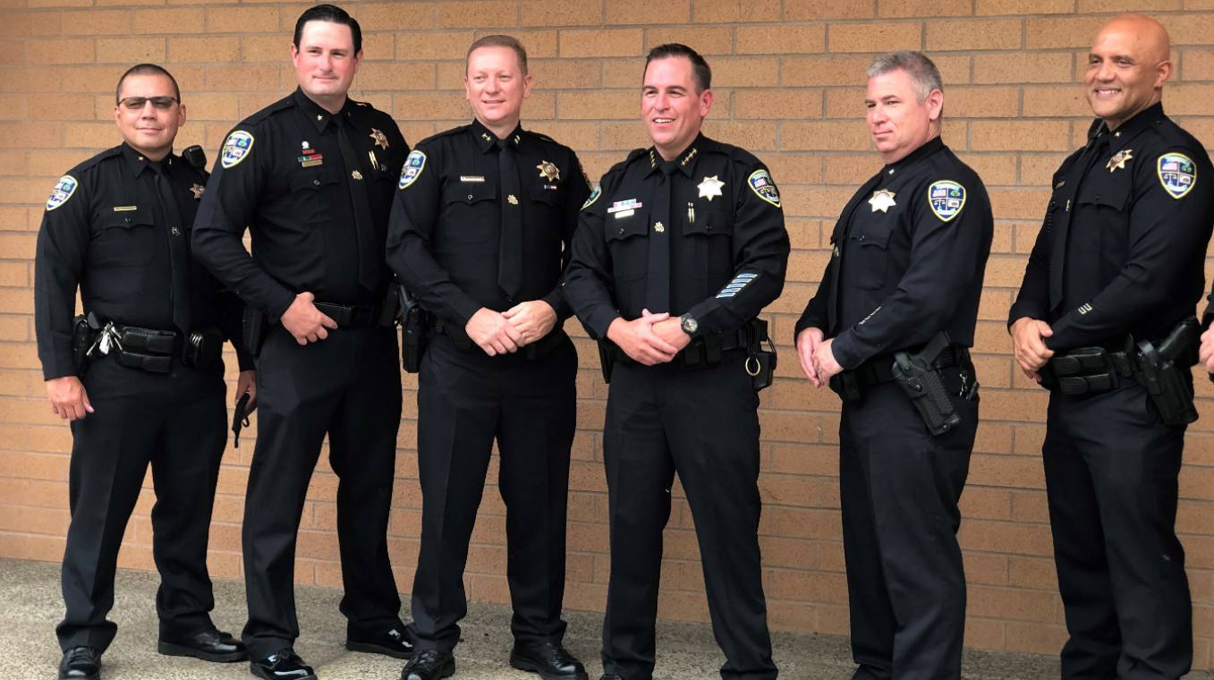 Image of Chief Madden (fourth from left) with his fellow police officers