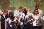 Two individuals sing together at the Gospel Choir Concert