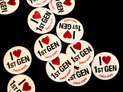 Pins saying 'I Love 1st Gen - Chico State.' 